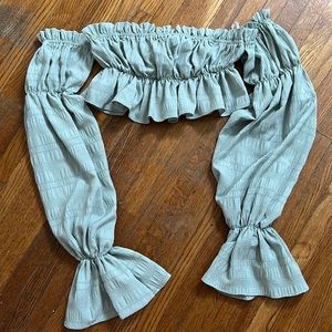 An off the shoulder pirate styled top. Super cute and trendy!